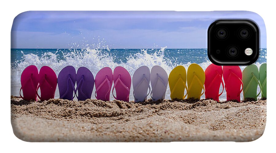 Water iPhone 11 Case featuring the photograph Rainbow of Flip Flops on the Beach by Teri Virbickis
