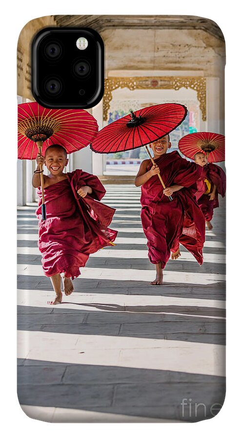 Children iPhone 11 Case featuring the photograph Young buddhist monks on the run - Myanmar by Matteo Colombo