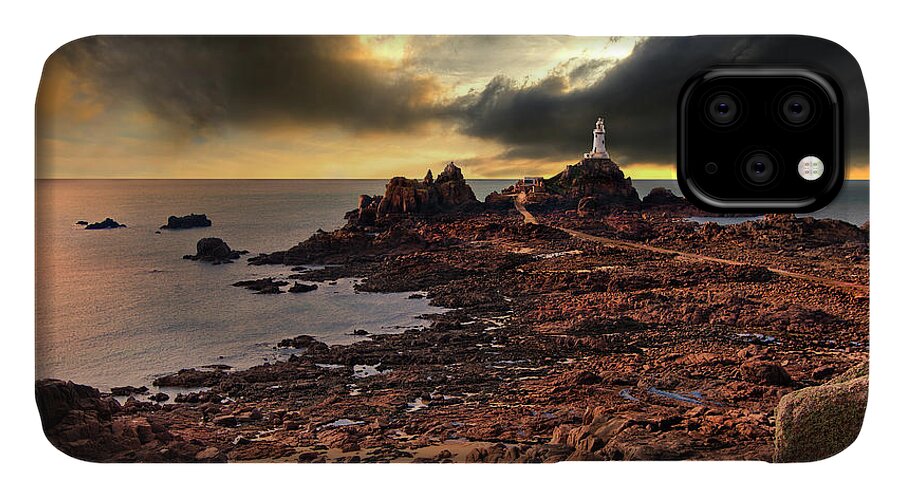 Lighthouse iPhone 11 Case featuring the photograph after the storm at La Corbiere by Meirion Matthias