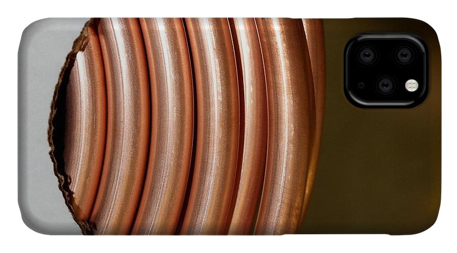 Copper Tubing In A Package. iPhone 11 Case featuring the photograph Copper Curves by Natalie Dowty