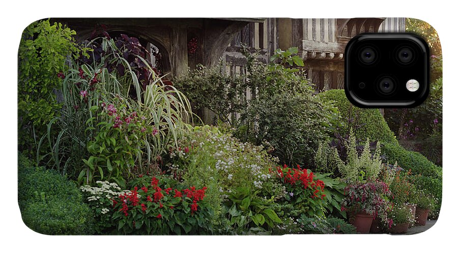 Sunset iPhone 11 Case featuring the photograph Great Dixter House and Gardens at Sunset 2 by Perry Rodriguez