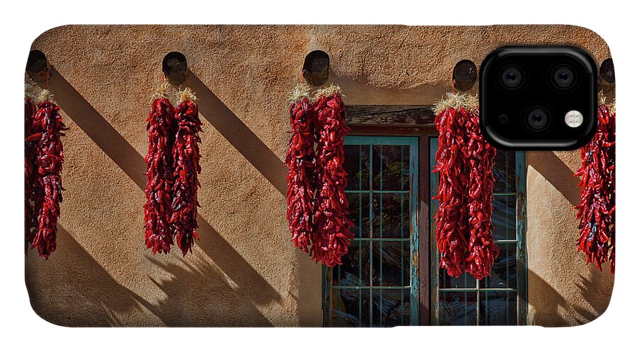 Taos iPhone 11 Case featuring the photograph Hanging Chili Ristras - Taos by Stuart Litoff