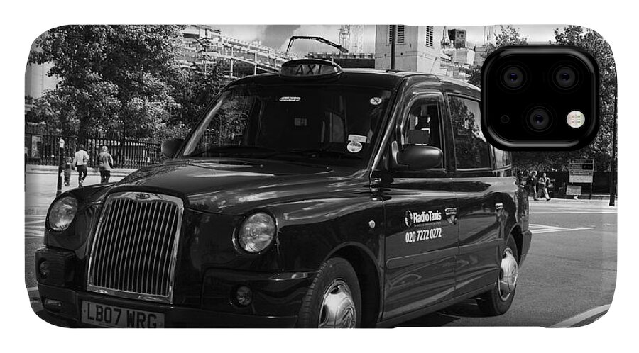 London iPhone 11 Case featuring the photograph London Taxi by Agusti Pardo Rossello