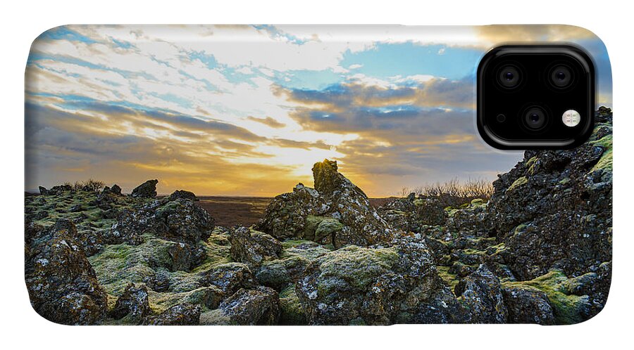 Iceland iPhone 11 Case featuring the photograph November Light Over Icelandic Lava Field by Alex Blondeau