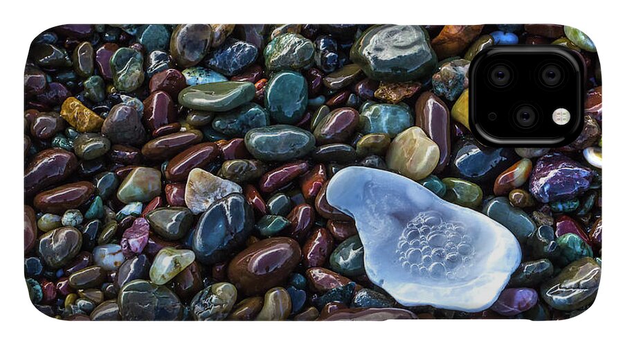 Rocks iPhone 11 Case featuring the photograph Rainbow Pebbles by Laura Roberts