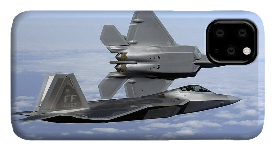 Aircraft iPhone 11 Case featuring the photograph Two F-22a Raptors In Flight by Stocktrek Images