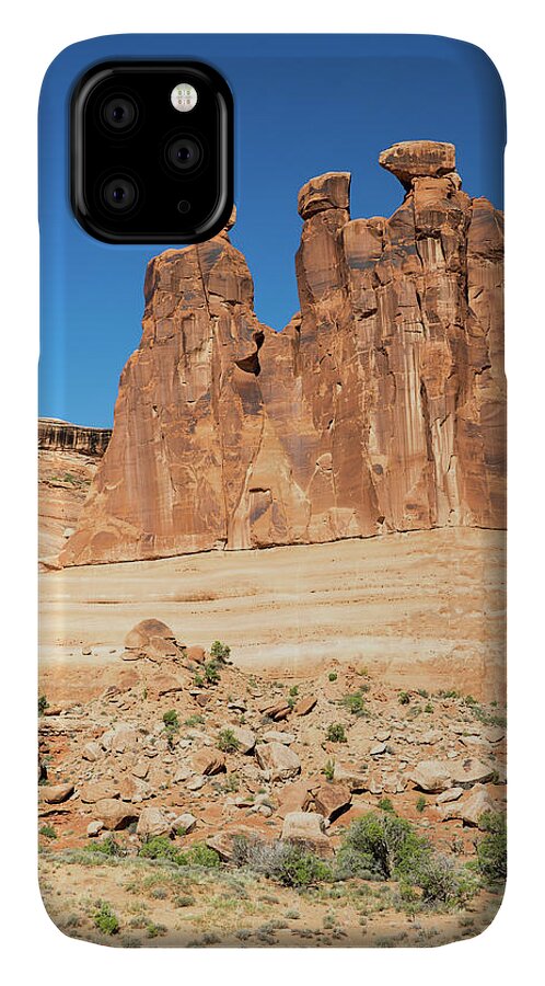 Balanced Rock iPhone 11 Case featuring the photograph Balanced Rocks in Arches by Kyle Lee