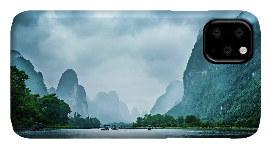 Boats iPhone 11 Case featuring the digital art Foggy morning on the Li River by Kevin McClish