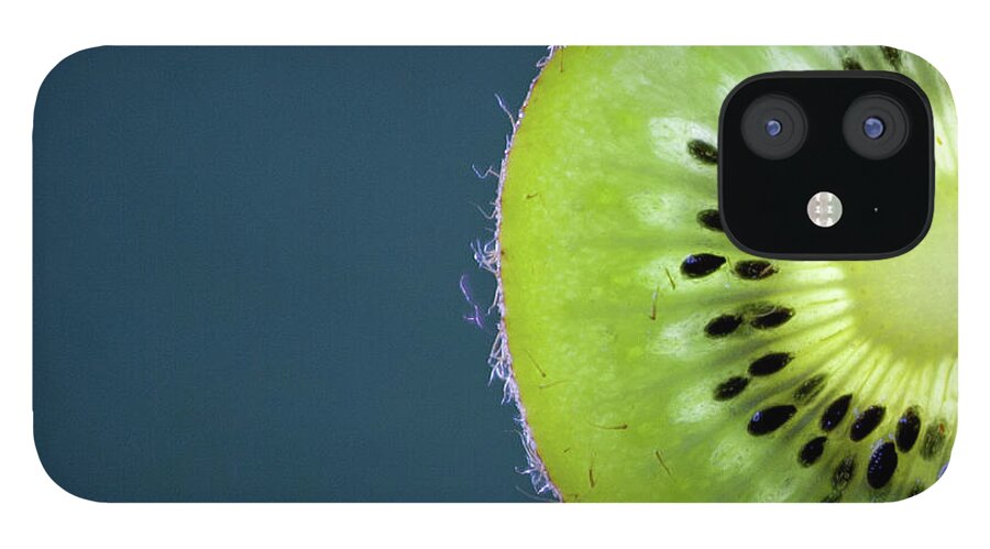 Close-up iPhone 12 Case featuring the photograph Slice Of Kiwi Fruit #1 by By Felix Schmidt