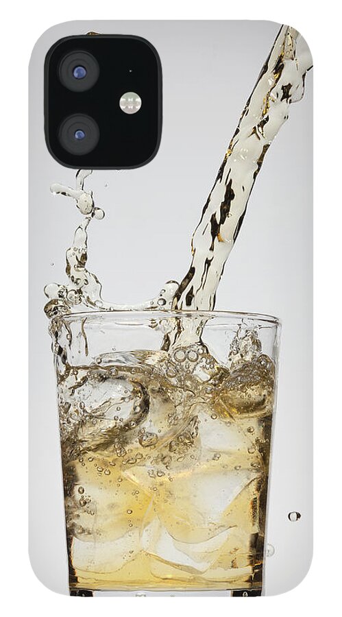Orange Color iPhone 12 Case featuring the photograph A Drink Being Poured Into A Glass #2 by Dual Dual