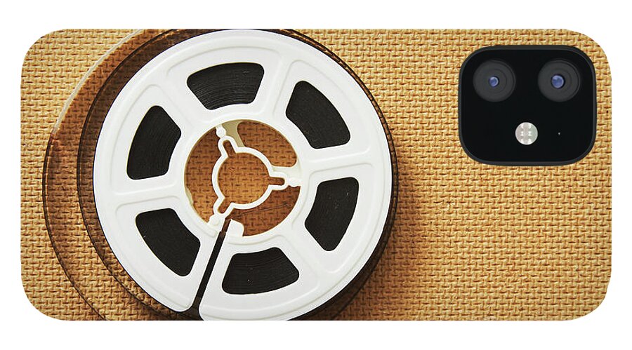 A Reel, Or Spool, Of 8mm Movie Film iPhone 12 Case by Jon Schulte