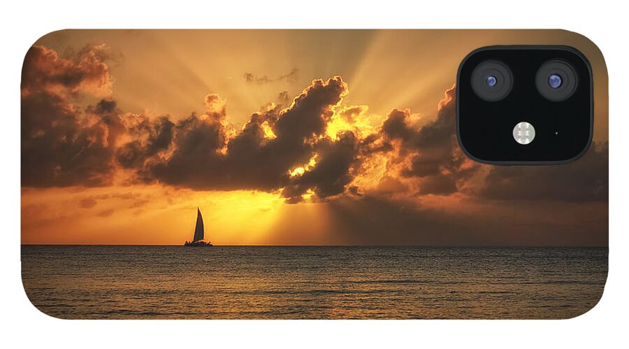 Caribbean iPhone 12 Case featuring the photograph About to Burst by Carrie Cole