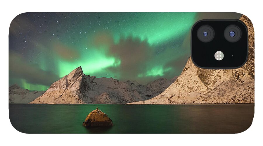 Scenics iPhone 12 Case featuring the photograph Aurora Borealis Over Snowy Mountains by Lesleygooding