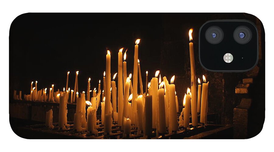Burning Candles iPhone 12 Case featuring the photograph candles in a Roman Catholic church by Jolly Van der Velden