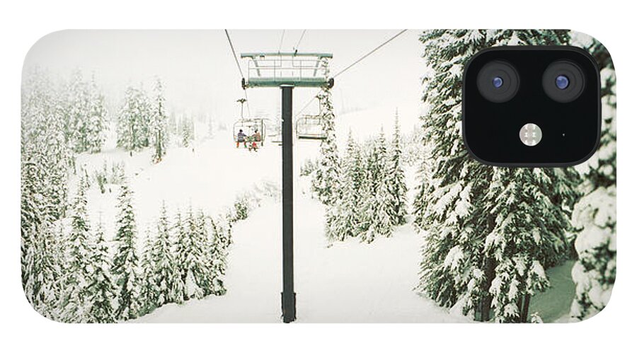 Photography iPhone 12 Case featuring the photograph Chair Lift And Snowy Evergreen Trees by Panoramic Images