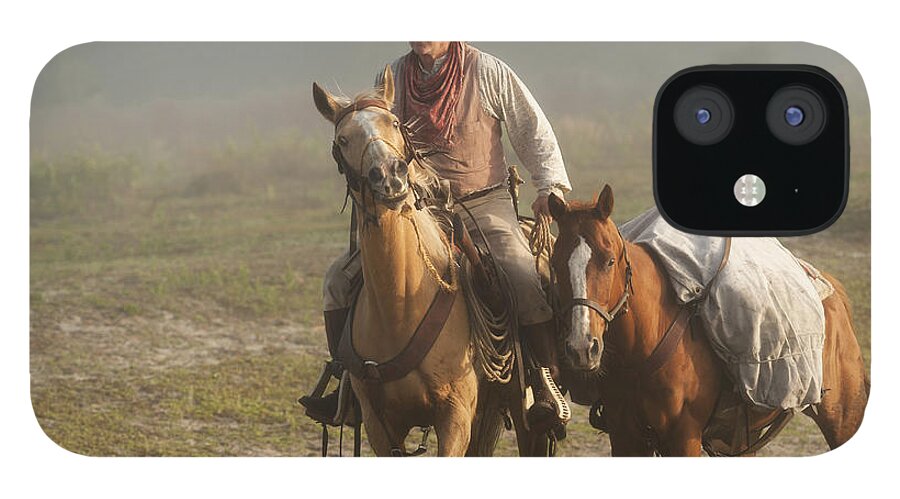 Cowboy iPhone 12 Case featuring the photograph Chasing Dreams by Linda Constant