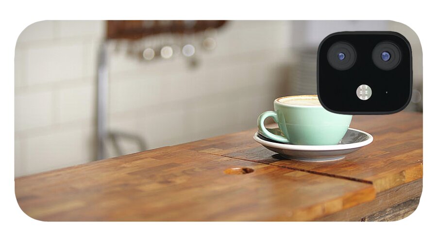 Single Object iPhone 12 Case featuring the photograph Cup Of Coffee In A Mint Green Mug by Ezra Bailey