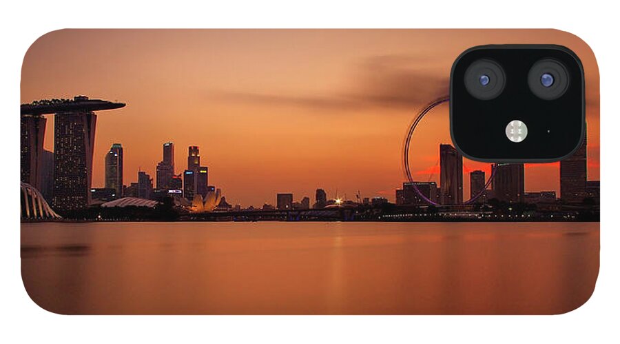 Panoramic iPhone 12 Case featuring the photograph Dusk At Marina Bay Sands + Singapore by © Copyright Kengoh8888