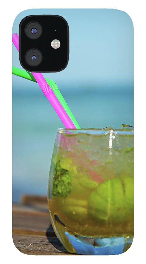 Outdoors iPhone 12 Case featuring the photograph Glass Of Mojito Cocktail By Tropical by Sami Sarkis