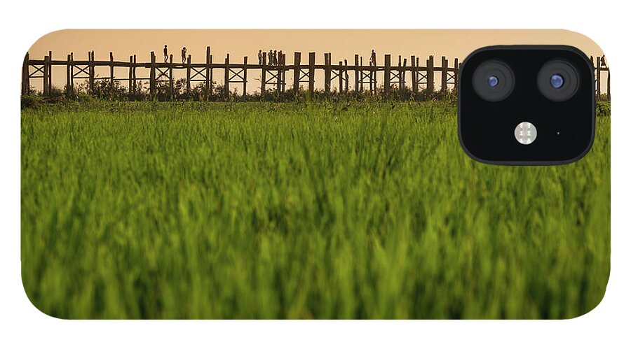 Built Structure iPhone 12 Case featuring the photograph Large Rice Paddy Below U Bein Bridge by Merten Snijders