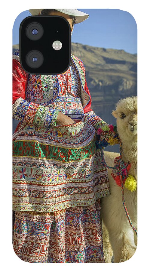 Baby iPhone 12 Case featuring the photograph Native Peruvian woman with baby alpaca by Patricia Hofmeester