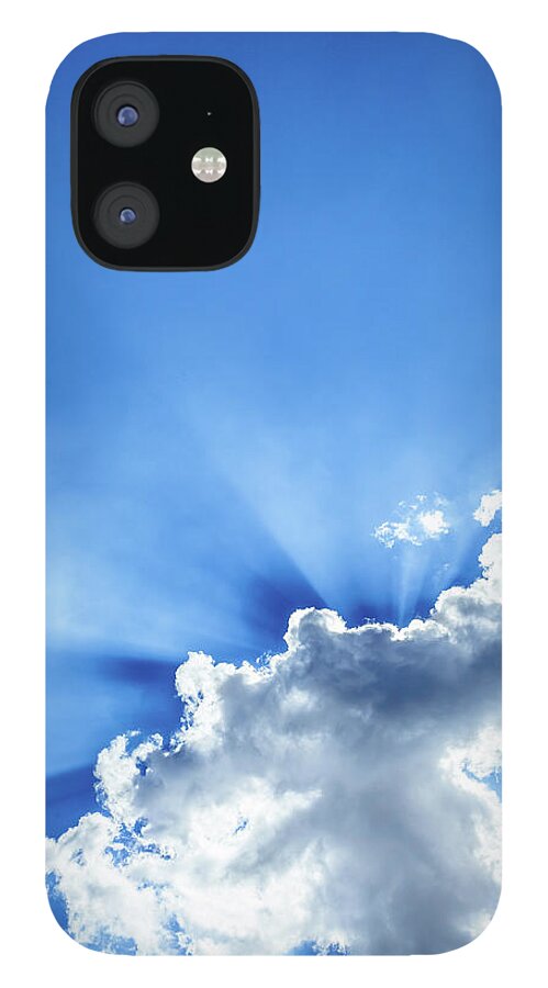 Rays Of Light Behind Clouds In A Blue iPhone 12 Case by Giorgiomagini 