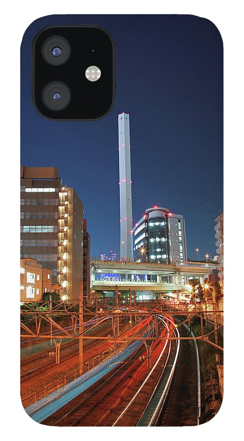 Train iPhone 12 Case featuring the photograph Skyline Of Tokyo Ikebukuro And Train by Photography By Zhangxun