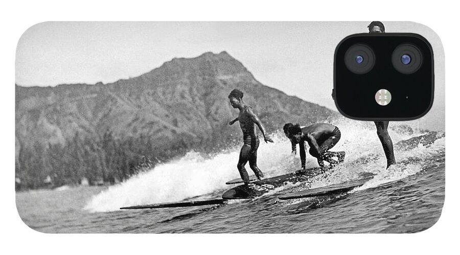 16-20 Years iPhone 12 Case featuring the photograph Surfing In Honolulu by Underwood Archives
