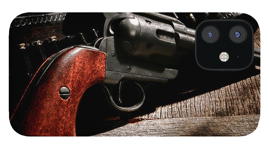 Revolver iPhone 12 Case featuring the photograph The Gun that Won the West by Olivier Le Queinec