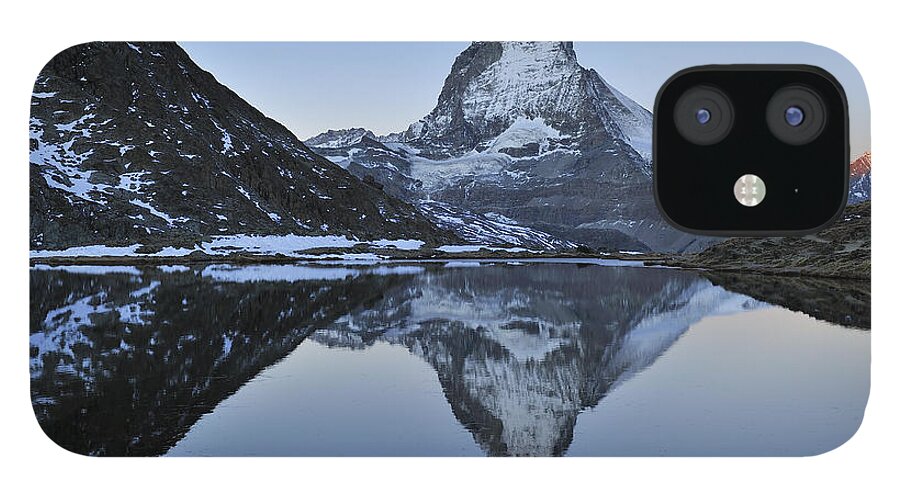 Feb0514 iPhone 12 Case featuring the photograph The Matterhorn And Riffelsee Lake by Thomas Marent