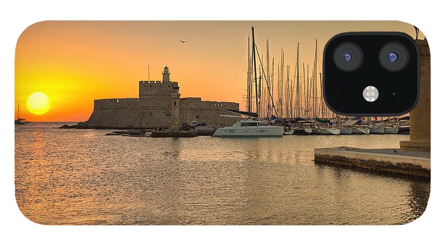 Aegean iPhone 12 Case featuring the photograph The sunrise at the old port of Rhodes - Greece by Constantinos Iliopoulos