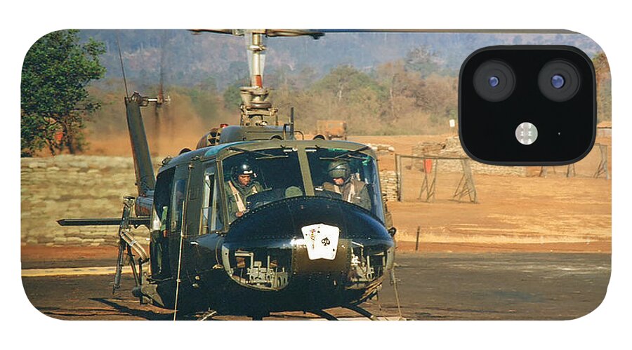  Uh-1 iPhone 12 Case featuring the photograph UH-1 Huey Iroquois Helicopter LZ Oasis Vietnam 1968 by Monterey County Historical Society