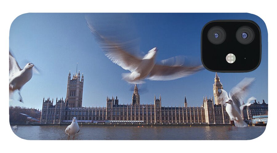 Clock Tower iPhone 12 Case featuring the photograph Westminster Palace And Big Ben With Sea by Laurence Monneret
