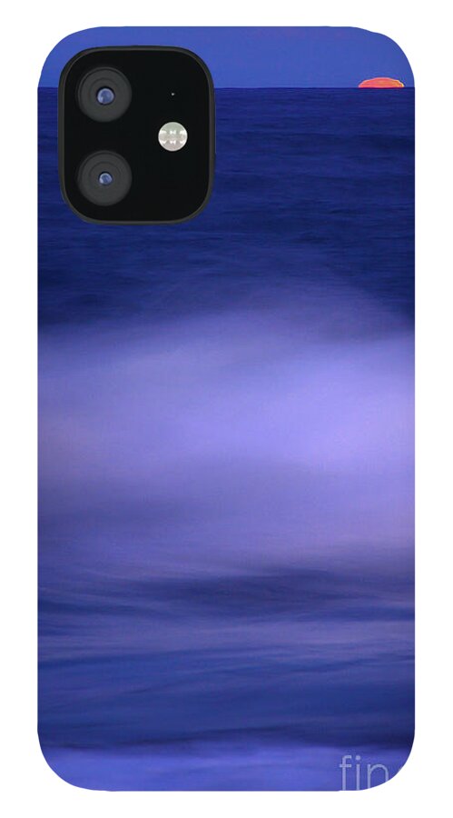 Sea iPhone 12 Case featuring the photograph The Red Moon And The Sea by Hannes Cmarits