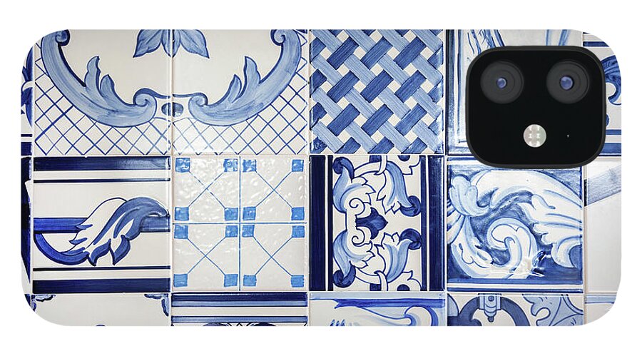 Decoration; Wall; Decorative; Ceramic; Texture; Floral; Color; Blue; Colorful; Mosaic; Portuguese; Tiles; Geometrical; Art; Antique; Artistic; Background; Lisbon; Old; Detail; Pattern; Traditional; Fabric; Portugal; Abstract; Facade iPhone 12 Case featuring the photograph Tile Blue Background #1 by Ariadna De Raadt