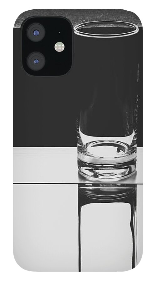 Glasses iPhone 12 Case featuring the photograph Glasses on a table BW by Iryna Liveoak