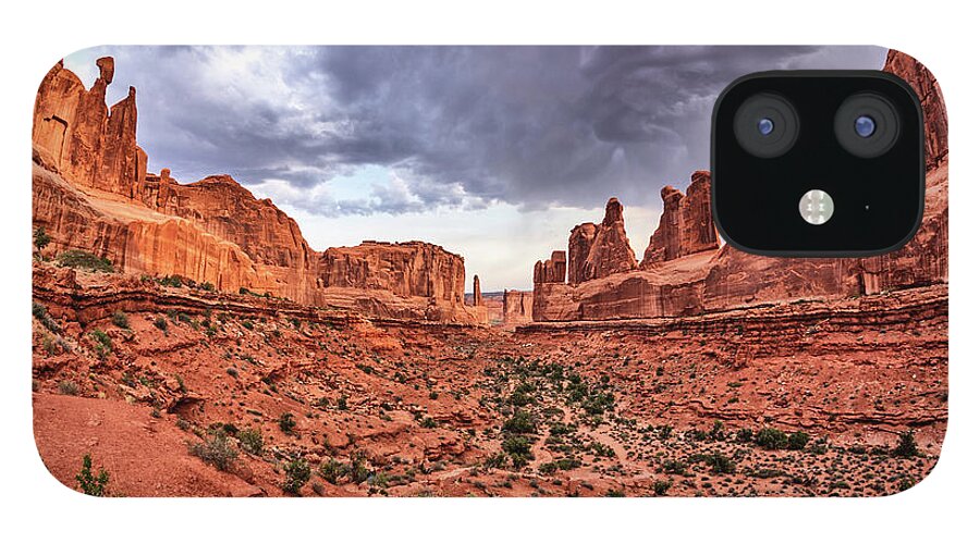 Moab iPhone 12 Case featuring the photograph Park Avenue with Storm Clouds - Arches NP by Kyle Lee