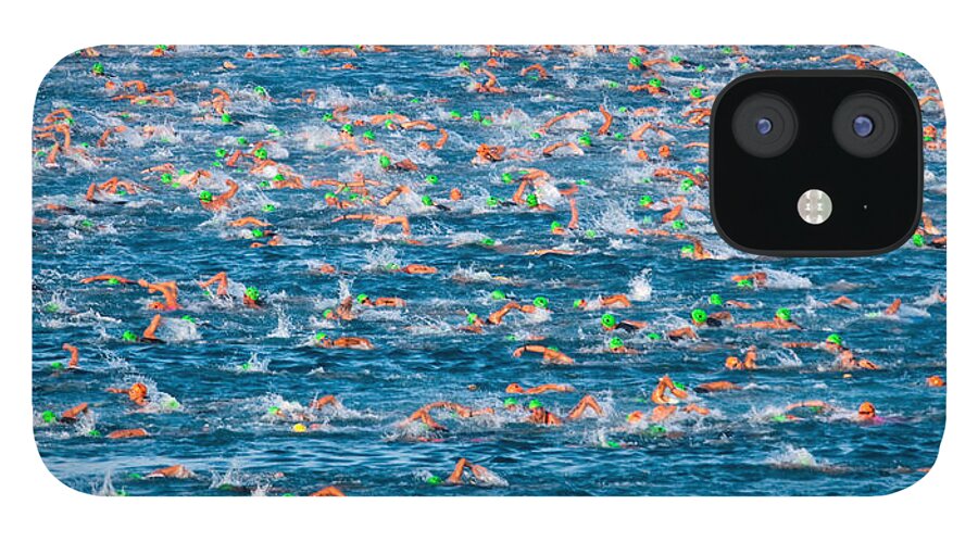 Photography iPhone 12 Case featuring the photograph People Competing In The Ford Ironman by Panoramic Images
