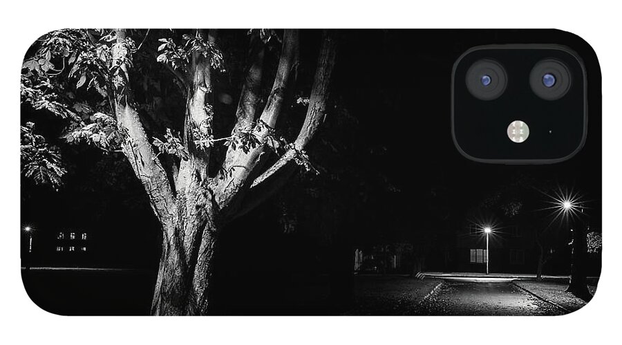 Rural iPhone 12 Case featuring the photograph Rural street life at night by Simon Bratt