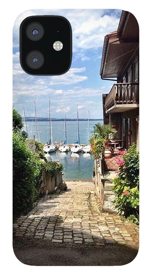 Annecy France iPhone 12 Case featuring the photograph Seaside view by Lauren Serene