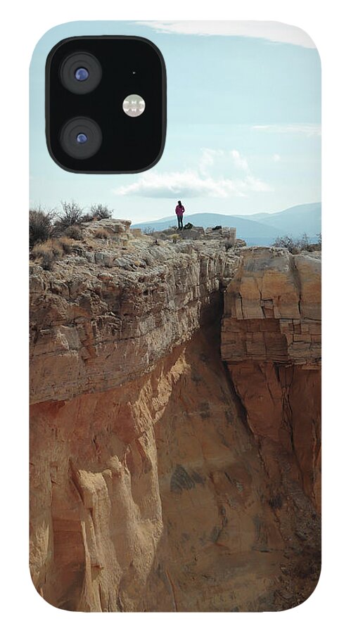 Hiker iPhone 12 Case featuring the photograph Standing on the Edge by David Diaz