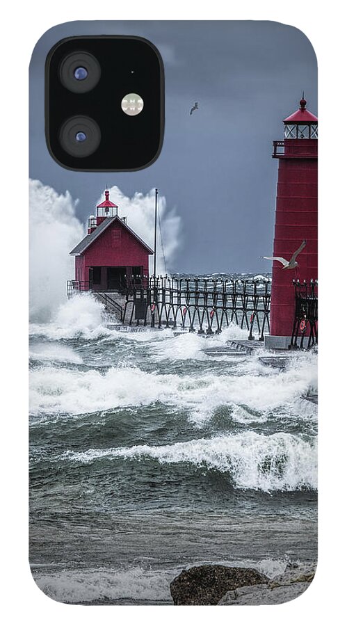 Lighthouse iPhone 12 Case featuring the photograph Storm on Lake Michigan by the Grand Haven Lighthouse with Flying Gulls by Randall Nyhof