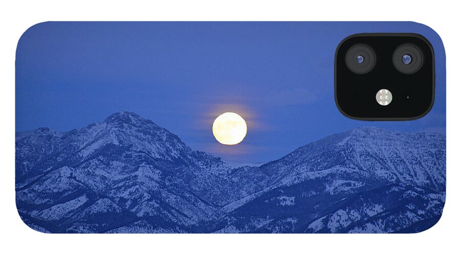 Moon iPhone 12 Case featuring the photograph Winter Full Moon Over the Rockies by Bruce Gourley