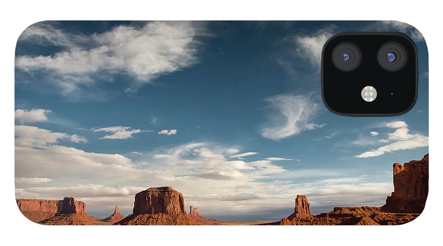 Scenics iPhone 12 Case featuring the photograph Monument Valley With Dramatic Clouds #1 by Russell Burden