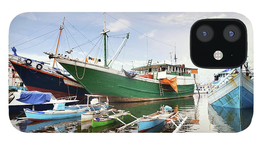Tranquility iPhone 12 Case featuring the photograph Anchored Boats by Ahmad Syukaery