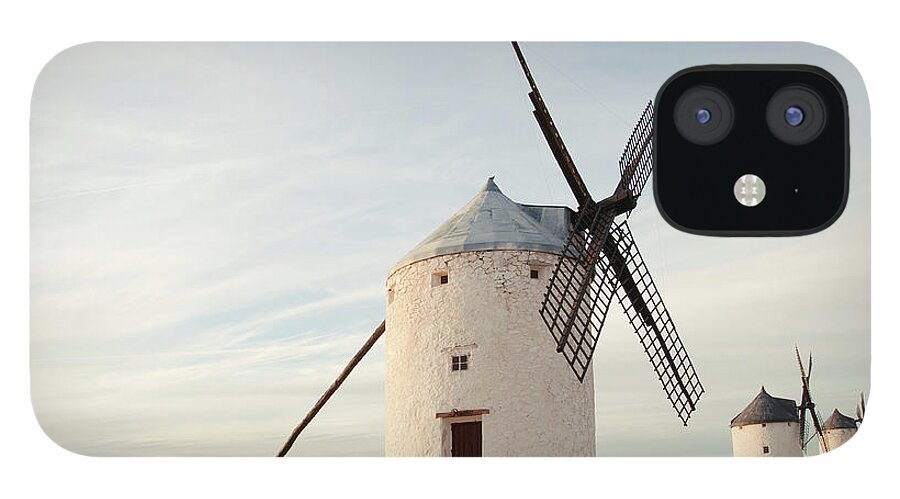 Tranquility iPhone 12 Case featuring the photograph Antique Rural Windmills In Consuegra by Irantzu Arbaizagoitia Photography