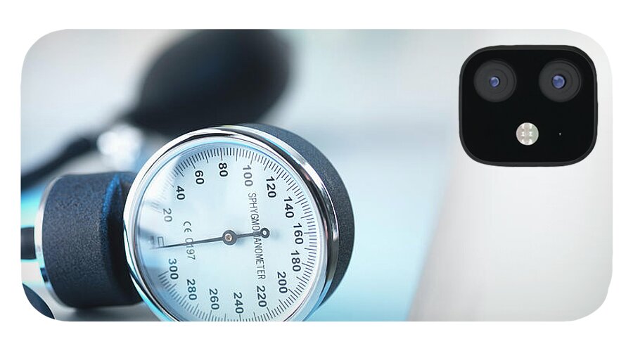Care iPhone 12 Case featuring the photograph Blood Pressure Gauge In Doctors Surgery by Andrew Brookes