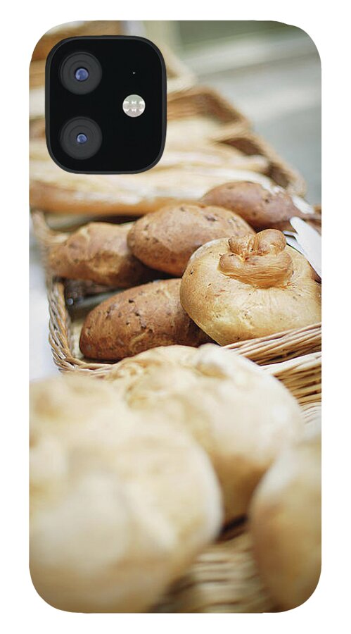 Bakery iPhone 12 Case featuring the photograph Breads For Sale On Table by Floresco Productions