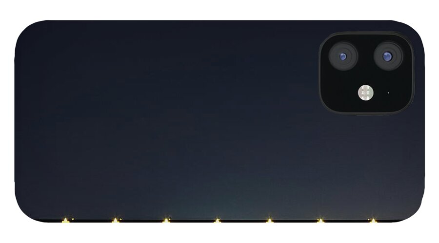 Empty iPhone 12 Case featuring the photograph Candles In A Row By The Window by Sot