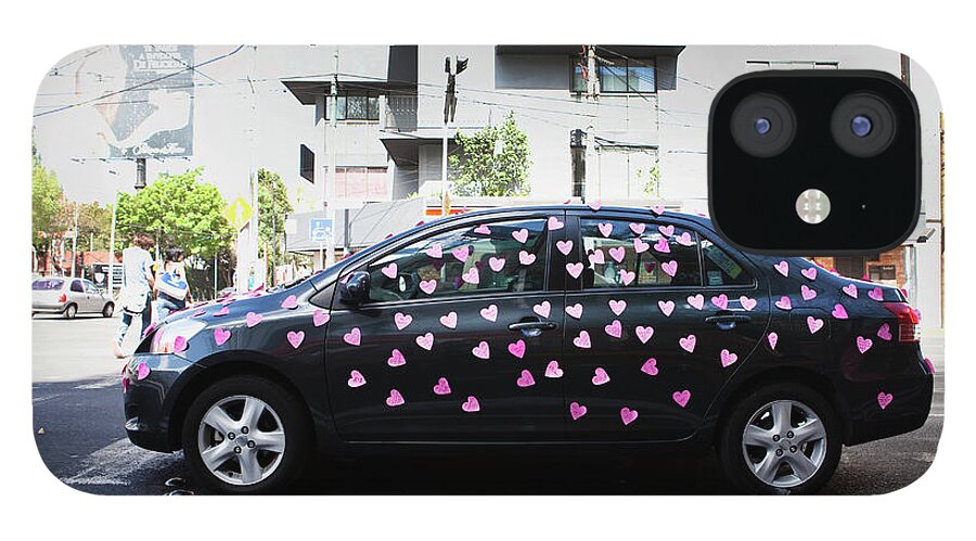 Mexico City iPhone 12 Case featuring the photograph Car Covered With Paper Hearts by Russell Monk
